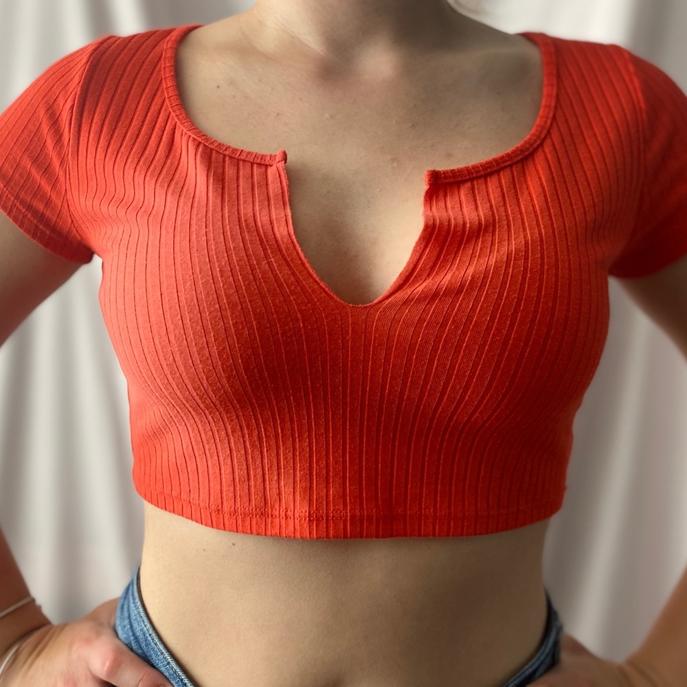 Reddish orange crop top